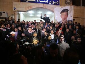 Supporters and family members of the Jordanian pilot Moaz al-Kasasbeh gathered in Amman (AFP/File Photo)	