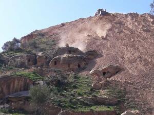 The tombs, dating back to the Bronze Age, were seen being “buried by bulldozers” being used to construct the new detour. (Photo courtesy of Jordan Times/Yousef Zuraiqat)
