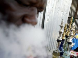 Man smokes Shisha (AFP/File Photo)
