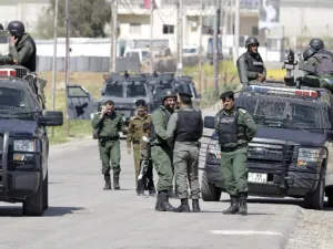 Members of the Jordanian security forces stand guard at a border crossing. (AFP/ File Photo)