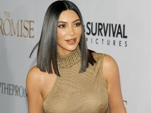 Kim was looking forward to the high school reunion as she knew there was no chance of any awkward run-ins with her former classmates. (Source: Tinseltown - Shutterstock)