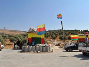 Election dates have been set for local councils and the regional assembly in Rojava. Image shows a Kurdish checkpoint in Northern Syria. (AFP / File Photo)