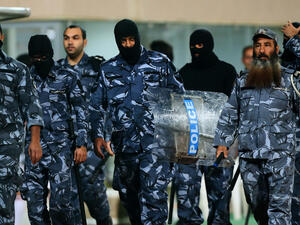 Kuwait riot police are seen patrolling outside a football game in 2012. (AFP/File)