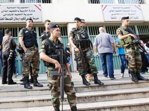 Lebanese security forces guard a polling station in Beirut on May 8. (AFP/File)