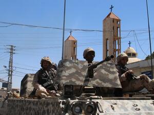 Lebanese soldiers on patrol in al-Qaa, after a series of deadly suicide bombings in the Christian town. (AFP/Stringer)