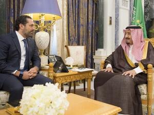 King Salman bin Abdulaziz al-Saud (R) meeting with Lebanese caretaker prime minister Saad Hariri in Riyadh. (AFP/ File Photo)