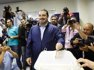 Lebanese former prime minister Saad Hariri (C) casts his vote for the municipal elections on May 8, 2016. (AFP/File)