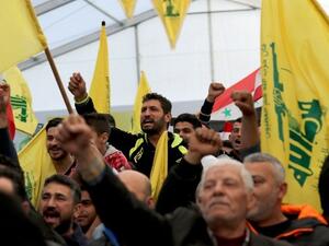 Supporters of Hezbollah rally around securing the electoral threshold in the Zoaiter in Jbeil seat (AFP/ File Photo)
