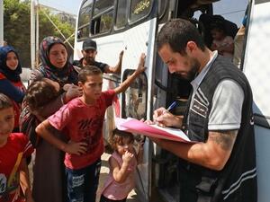 Syrian refugees gather as they prepare to leave Beirut before their journey to return home to Syria on Sept. 4, 2018. (AFP / ANWAR AMRO)