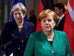 German Chancellor Angela Merkel and British Prime Minister Theresa. (AFP/File)