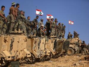 Lebanese soldiers stand on armoured vehicles. (AFP/ File)