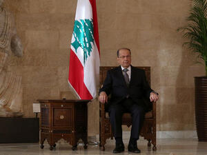Lebanese president-elect Michel Aoun sits on the presidential chair at the presidential palace in Baabda east of Beirut on Oct. 31, 2016. (AFP/File)