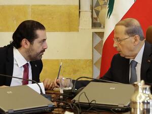Lebanese President Michel Aoun, right, and Prime Minister-designate Saad Hariri at the presidential palace. (AFP)
