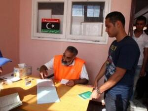 Libyans register to vote in the upcoming legislative elections in Tripoli. (AFP/ File Photo)