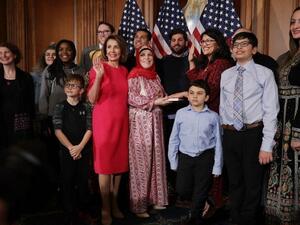 Speaker of the House Nancy Pelosi with Rep. Rashida Tlaib and her family in the Rayburn Room at the U.S. Capitol January 03, 2019 in Washington, DC. (AFP)