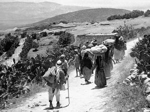 A picture dates to September 15, 1948 shows Palestinian refugees returning to their village after its surrender during the Arab war. (AFP)