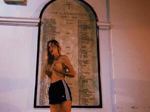 The 31-year-old singer said the pictures were taken inside the grounds of a London church while she was drunk (Twitter)