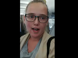 Elin Ersson, 21, stood up to stop the deportation of an Afghan man who was on her plane, in protest of the Swedish authorities policy of deporting migrants. (Screenshot)