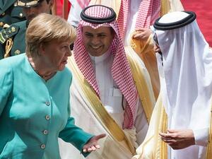 A handout picture provided by the Saudi Royal Palace shows German Chancellor Angela Merkel (L) chatting with Saudi Arabia’s King Salman (R) during a welcome ceremony in Riyadh on April 30, 2017. (AFP/ Bandar Al-Jaloud) A handout picture provided by the Saudi Royal Palace shows German Chancellor Angela Merkel (L) chatting with Saudi Arabia’s King Salman (R) during a welcome ceremony in Riyadh on April 30, 2017. (AFP/ Bandar Al-Jaloud)