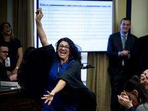 US Representative-elect Rashida Tlaib (D-MI) reacts to a good number during an office lottery for new members of Congress on Capitol Hill November 30, 2018 in Washington, DC. 
Brendan Smialowski / AFP