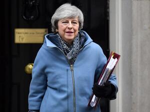 Britain's Prime Minister Theresa May leaves 10 Downing Street in London on February 13, 2019 ahead of the weekly Prime Ministers Questions session in the House of Commons. (AFP/ File)