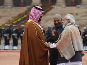 India's President Ram Nath Kovind (C) looks on as Saudi Crown Prince Mohammed bin Salman (L) and India's Prime Minister Narendra Modi shake hands in New Delhi. (AFP/ File Photo)