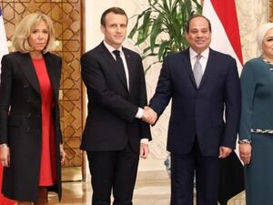 Emmanuel Macron and wife Brigitte Macron are welcomed by Abdel Fattah al- Sissi and Intissar Amer at the presidential palace in Cairo. (AFP/ File Photo)