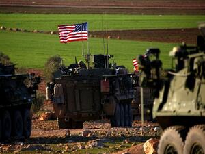 A convoy of US forces armored vehicles drives near the village of Yalanli, on the western outskirts of the northern Syrian city of Manbij, on March 5, 2017. (AFP/ file Photo)
