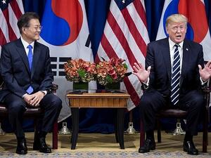 South Korea's President Moon Jae-in (L) listens as US President Donald Trump speaks to the press before a meeting at New York's Palace Hotel. (AFP)