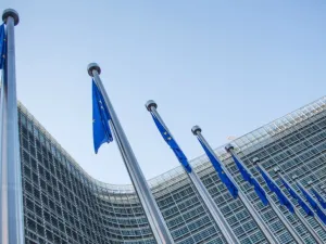 EU flags in front of the European Commission headquarters at the Berlaymont Building in Brussels. (AFP/File)
