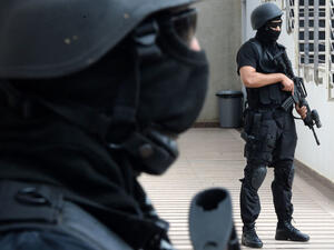 Members of the Moroccan special forces stand guard inside the Moroccan Central Bureau of Judicial Investigation (BCIJ) building. (AFP)
