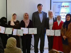 USAID Deputy Mission Director Ralph Koehring (centre) stands with the first group of graduates from Al Nashmeyah Arms for Maintenance Centre on Monday (Photo courtesy of USAID)