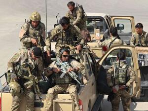 Afghan Special Forces arrive at the airport as they launch a counteroffensive to retake the city from Taliban insurgents, in Kunduz. (AFP/File)