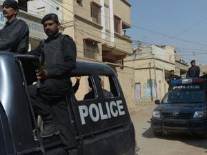 Pakistani policemen arrive at the scene at a shooting in January. (AFP/ File)