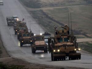 A convoy of U.S. military vehicles near Syria's northern city of Manbij on Dec. 30, 2018.. (AFP)