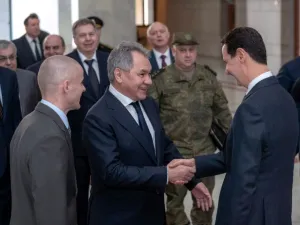 Syrian President Bashar al-Assad greeting the visiting Russian defence minister, Sergei Shoigu, in Damascus on March 19, 2019. (AFP /STRINGER)
