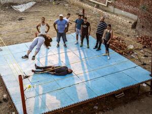 Egypt's wrestling federation started off with just eight fighters in 2012 and now has 50 amateurs from across the country. (AFP)