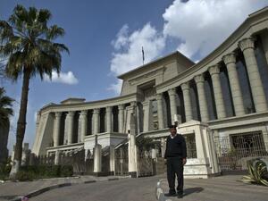 An Egyptian policeman stands guard outside the Supreme Constitutional Court in Cairo. (AFP/File)