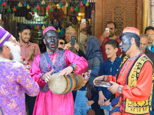 Dancers musicians with black face dance in the street in Bazaar to spread good cheer in Nowruz holidays in Iran. (Shutterstock/ File Photo)