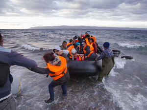 Syrian migrants arrive from Turkey on boat through sea with cold water near Molyvos, Lesbos on an overload dinghy. (Shutterstock/ File Photo)