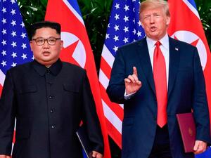 US President Donald Trump and North Korea leader Kim Jong-un in Singapore today. (Susan Walsh /AFP)