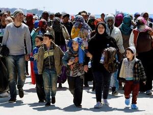 A group of refugees arriving in Italy in 2015. (AFP/File)