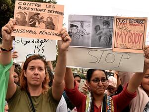 Moroccans chant slogans in Casablanca on August 23, 2017, during a protest against sexual harrasment following the sexual assault of a woman on a bus (AFP)