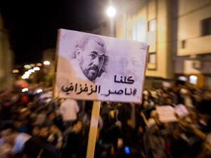 Anti-riot police were at the protest, following clashes between demonstrators and security forces over the weekend. (AFP) 
