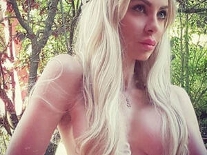 The Lebanese model let her Blonde tresses loose to cover her modesty in a snap that is taken in the middle of what looked like a forest. (Source: myriamklinkk - Instagram)