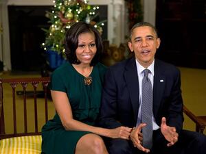 ميشيل اوباما في فستان من فيرساتشي