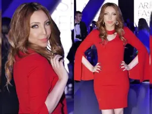 الفنانة هاجر فؤاد بفستان أحمر ساحر بـ أسبوع الموضة في دبي