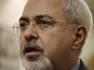 Iranian Foreign Minister Mohammad Javad Zarif talks to the press in Amman before his departure to Damascus.  [AFP] 