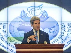US Secretary of State John Kerry speaks during a news conference on the sidelines of the Second International Humanitarian Pledging Conference for Syria, at the Bayan Palace in Kuwait City, on January 15, 2014. [AFP]