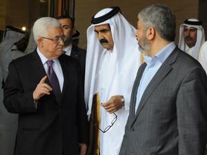 Head of the movement's politburo Khalid Mashaal, his deputy Ismail Haniyeh and President Abbas met in Qatar on Thursday, at the home of Qatar's Minister of Foreign Affairs Muhammad Bin Abed al-Rahman al-Thani. (AFP/File)